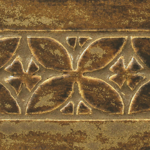 Textured Amber is a semi-matte brown glaze that has a varied, translucent surface with a textured float of opaque tan speckles. Amaranth Stoneware Canada.