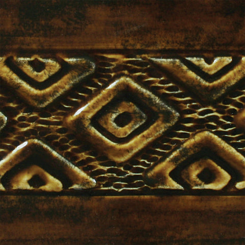 Glossy Textured Amber Brown glaze, breaking lighter on thin areas like a classic temmoku. Amaranth Stoneware Canada.