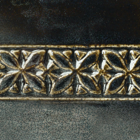 Cosmic Oil Spot glaze with dark base, shimmery flecks, creating color streams like hare’s fur. Amaranth Stoneware Canada.