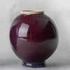 Copper Red glaze, oxblood hue with clear breaks on edges, mimicking reduction effects. Amaranth Stoneware Canada.