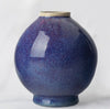 Flambé copper red glaze with purple and blue tones, clear breaks on edges, oxidation like reduction. Amaranth Stoneware Canada.