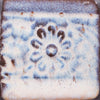 Glossy pale pink Flower glaze, breaking on texture with peachy float, perfect for layering. Amaranth Stoneware Canada.