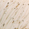 Glossy cream glaze with runny dark specks, breaking on texture with peachy float, great for layering. Amaranth Stoneware Canada.