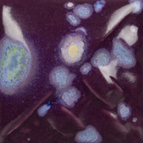 Passionflower Purple glossy, opaque deep purple glaze with opaque crystals blooming into blue, green, and yellow at Cone 6.
At Cone 10: Shifts to semi-opaque variegated blue, breaks over texture, crystals soften and lighten. Glaze remains stable. Amaranth Stoneware Canada.