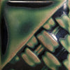 Rainforest soft matte emerald green glaze at Cone 6; pools dark and glossy, breaks light brown.
At Cone 10: Changes to light brown with green variation, increased movement. Amaranth Stoneware Canada.