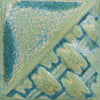 Riptide satin-matte, opaque turquoise/green glaze at Cone 6; breaks over texture, glossy where thick or pooling.
At Cone 10: Shifts to gray with white/turquoise pixelization, glaze remains stable. Amaranth Stoneware Canada.
