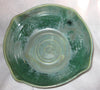 A popular, runny green glaze that creates unpredictable, varied finishes and explodes with crystals in a slow cool. Amaranth Stoneware Canada.