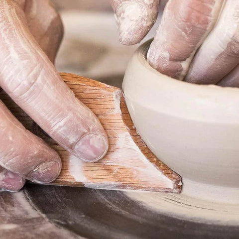 RU3 Rump Shaper Rib shapes bowls and plates with beveled edges, a sloping back, and a notched foot. Red Oak. Amaranth Stoneware Canada.