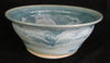 A runny pale blue glaze with icy blue crystals, especially when slow-cooled. Beautiful but requires care. Amaranth Stoneware Canada.