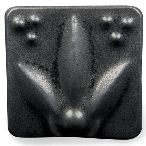 Satin Matte Black glaze, an opaque, buttery black, enhances textured ware with a classic art deco look. Amaranth Stoneware Canada.