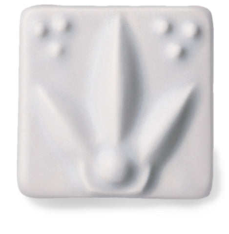 Satin Matte Marble glaze, a semi-opaque pale gray with a hint of color, breaks over texture with a classic look. Amaranth Stoneware Canada.