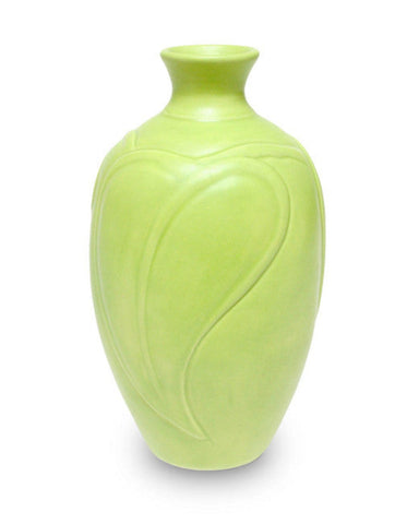 Satin Matte Mint glaze, an opaque, buttery light green, enhances textured ware with a classic art deco look. Amaranth Stoneware Canada.