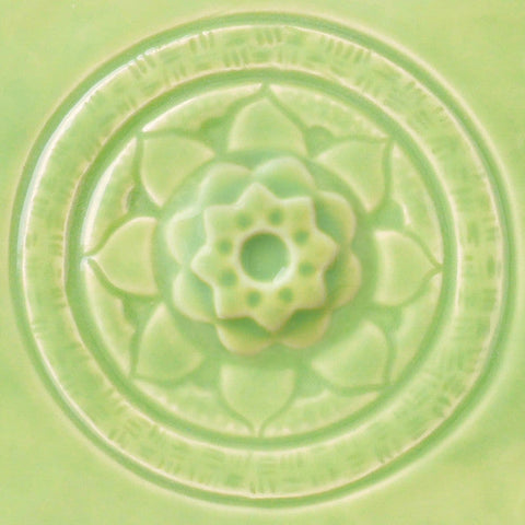 Translucent pale soft green glaze. Cone 5-6. Dinnerware Safe. Safe for Spray Application. Mixable. Amaranth Stoneware.