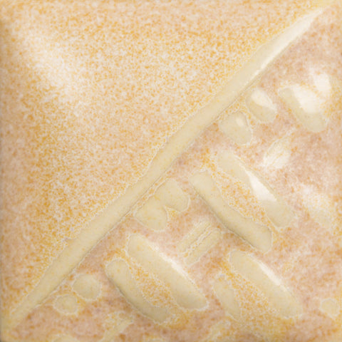 Sand Dollar satin, opaque cream-colored glaze with white and gold mottling at Cone 6; breaks glossy transparent over texture.
At Cone 10: Shifts to glossy variegated lavender with white micro-crystallization, breaks blue/grey over texture. Enhanced mobility. Amaranth Stoneware Canada.