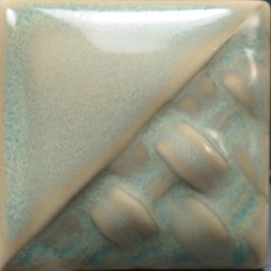 Sand & Sea semi-opaque gloss glaze with light green and gold at Cone 6; thicker application creates homogenous color, thinner breaks translucent and pools darker.
At Cone 10: Changes to cream/gray/brown. Amaranth Stoneware Canada.