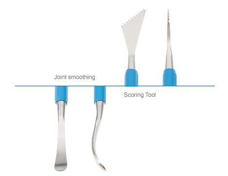 Scoring and Joint Smoothing Tool: Double-ended, stainless steel tool for scoring and smoothing joints. Comfortable rubber grip, durable and multi-purpose. Amaranth Stoneware Canada.