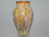 A variegated glaze with brown, orange, blue, and gold tones. Alternative to Red Gold. Amaranth Stoneware Canada.