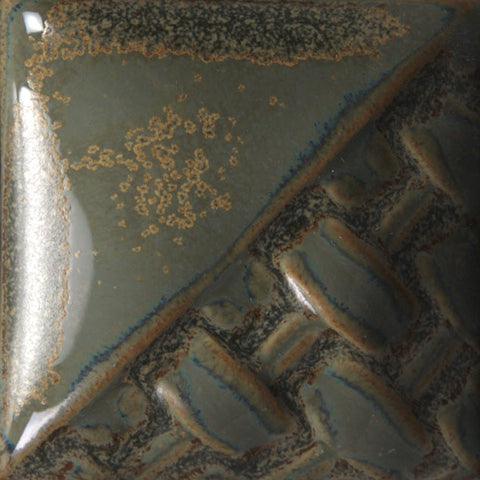 Smoke is an opaque grey-blue glaze with subtle variegation at Cone 6.
At Cone 10: Variegated sage green with a glossy finish. Amaranth Stoneware Canada.