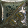 Cone 6: Speckled Toad is a shimmery green with dark grey specks that bloom, breaking to a semi-transparent olive green.
Cone 10: Color changes to olive green/metallic gray, breaking blue. Amaranth Stoneware Canada.
