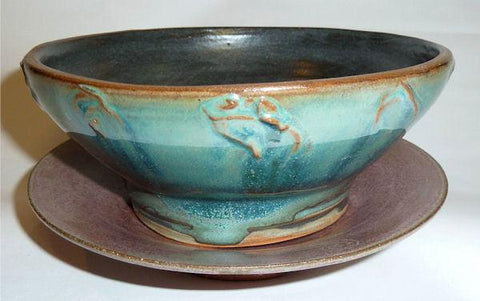 A popular, runny green glaze that creates unpredictable, varied finishes and explodes with crystals in a slow cool. Amaranth Stoneware Canada.