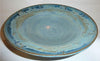 A runny pale blue glaze with icy blue crystals, especially when slow-cooled. Beautiful but requires care. Amaranth Stoneware Canada.