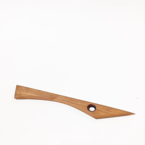 T1 knife tool for trimming, scraping, and shaping clay with sharp points, unique angles, and flat edges. 8.75