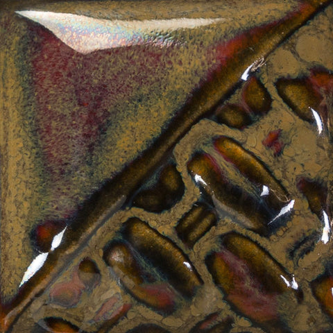 Cone 6: Tiger’s Eye breaks from glossy brownish-red to frothy amber, with more variation in thicker applications.
Cone 10: Color darkens. Amaranth Stoneware Canada.