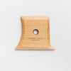 Unfoot 3 lifts your vessel with a soft curve and flat edge for easy undercutting while preserving wall shape. 4.25" x 3.25", made of maple wood. Handmade in St. Louis, MO. Amaranth Stoneware Canada.