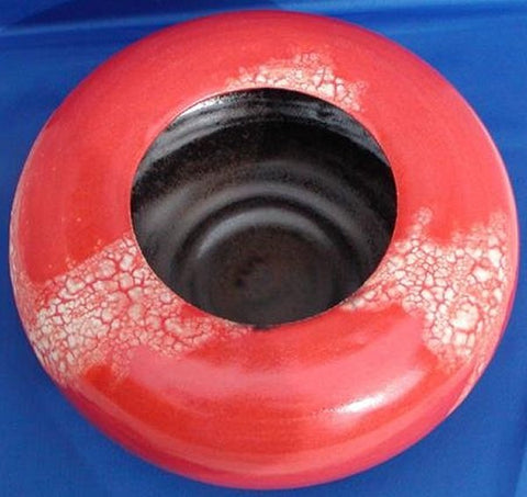 Coral Satin glaze, pinkish red with a buttery surface that doesn’t break or run, perfect for layering. Amaranth Stoneware Canada.