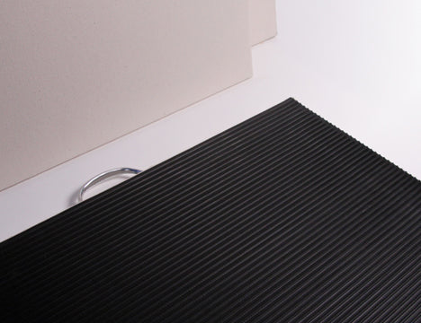 X-Board™ is a portable, durable clay board with a galvanized steel handle, non-skid rubber base, and canvas surface for easy wedging. Amaranth Stoneware Canada.