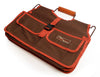 The Xiem Art Bag is a durable, breathable solution for ceramic tool storage. Features 17 pockets, 16 holsters, 2 large compartments, secure straps, and a reinforced bottom. Holds up to 25 lbs. Measures 16" x 9" x 12". Amaranth Stoneware Canada.