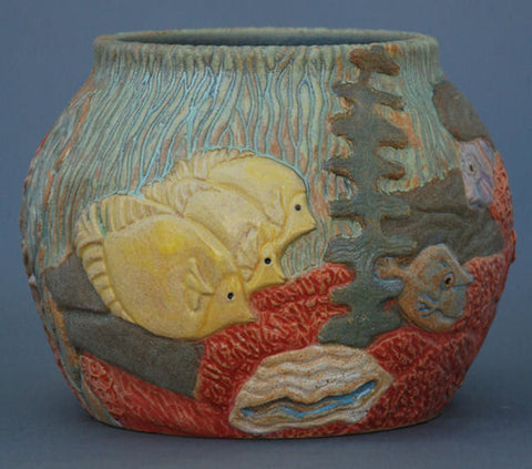 A bright, unbreaking yellow with a satin finish, similar to Buttercup but without the gloss. Amaranth Stoneware Canada.