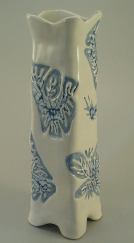 Eggshell glaze, a stable and glossy finish that offers a less bright alternative to white, ideal as a liner glaze for functional ware. Amaranth Stoneware Canada.
