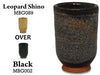 A lighter shino with orange-brown spots that breaks to brown over texture. Combines well with other glazes. Amaranth Stoneware Canada.